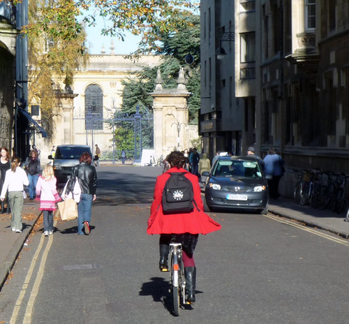 back-cyclist-bright-sun