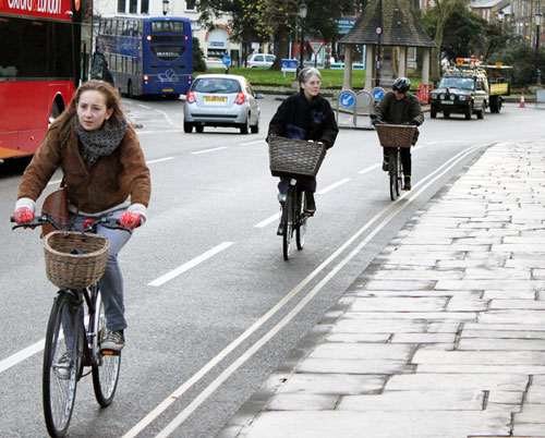 3 Cyclists on High Street